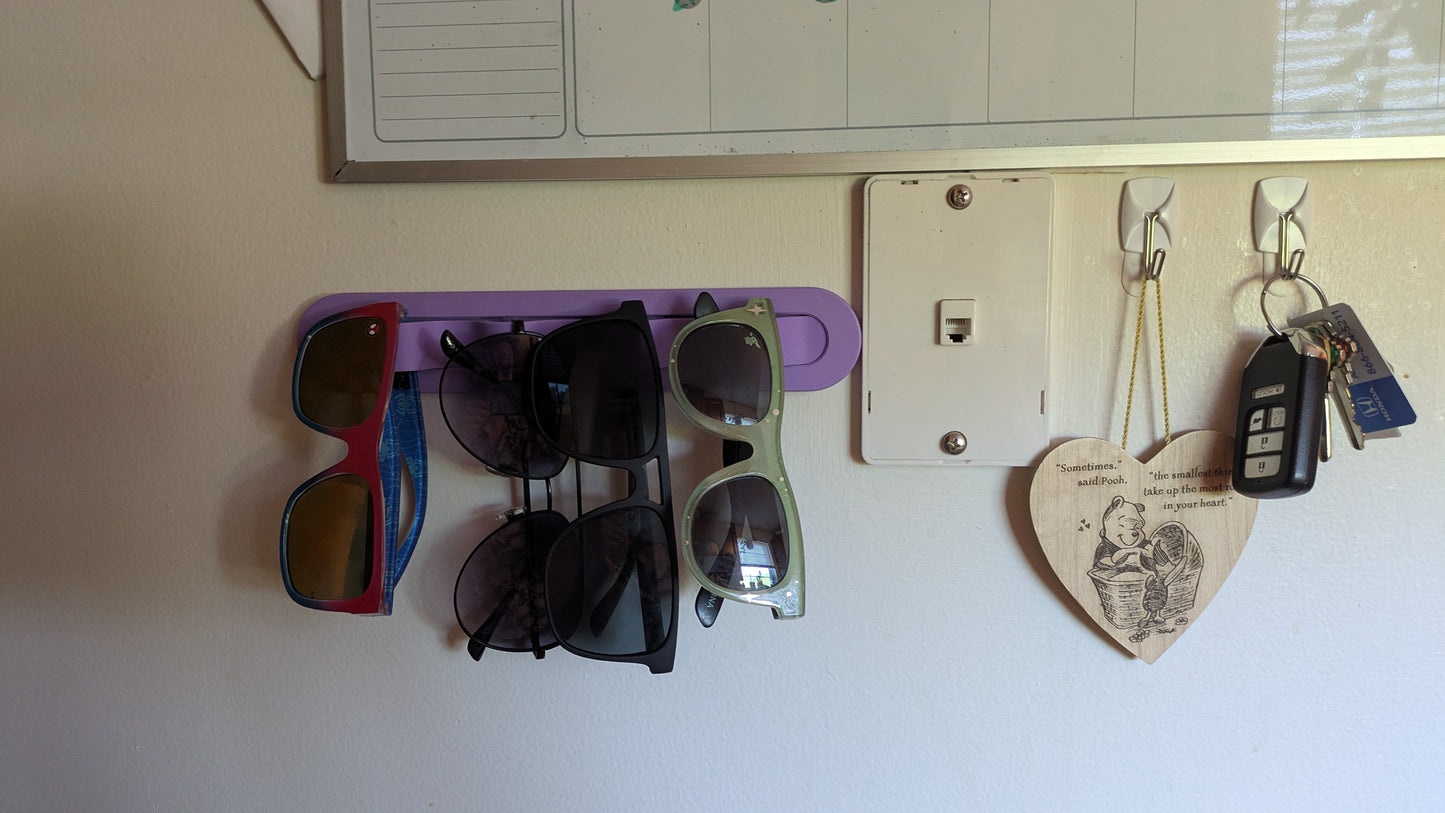 Simiu wall mounted sunglasses holder